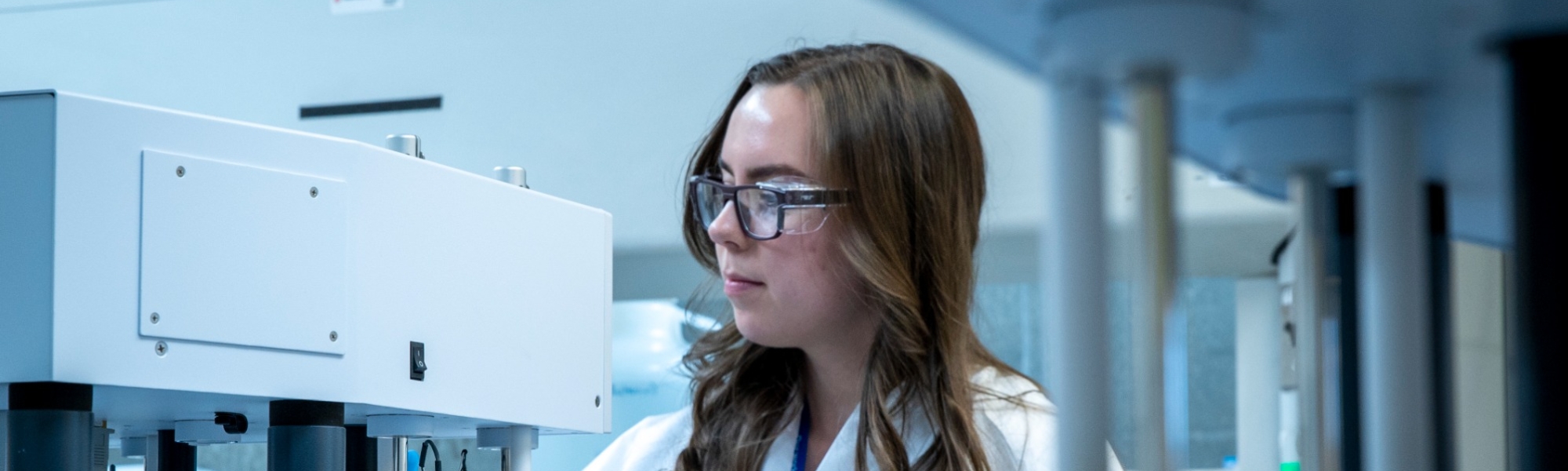 woman using drug product testing equipment